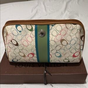 Authentic Coach cosmetic pouch.
